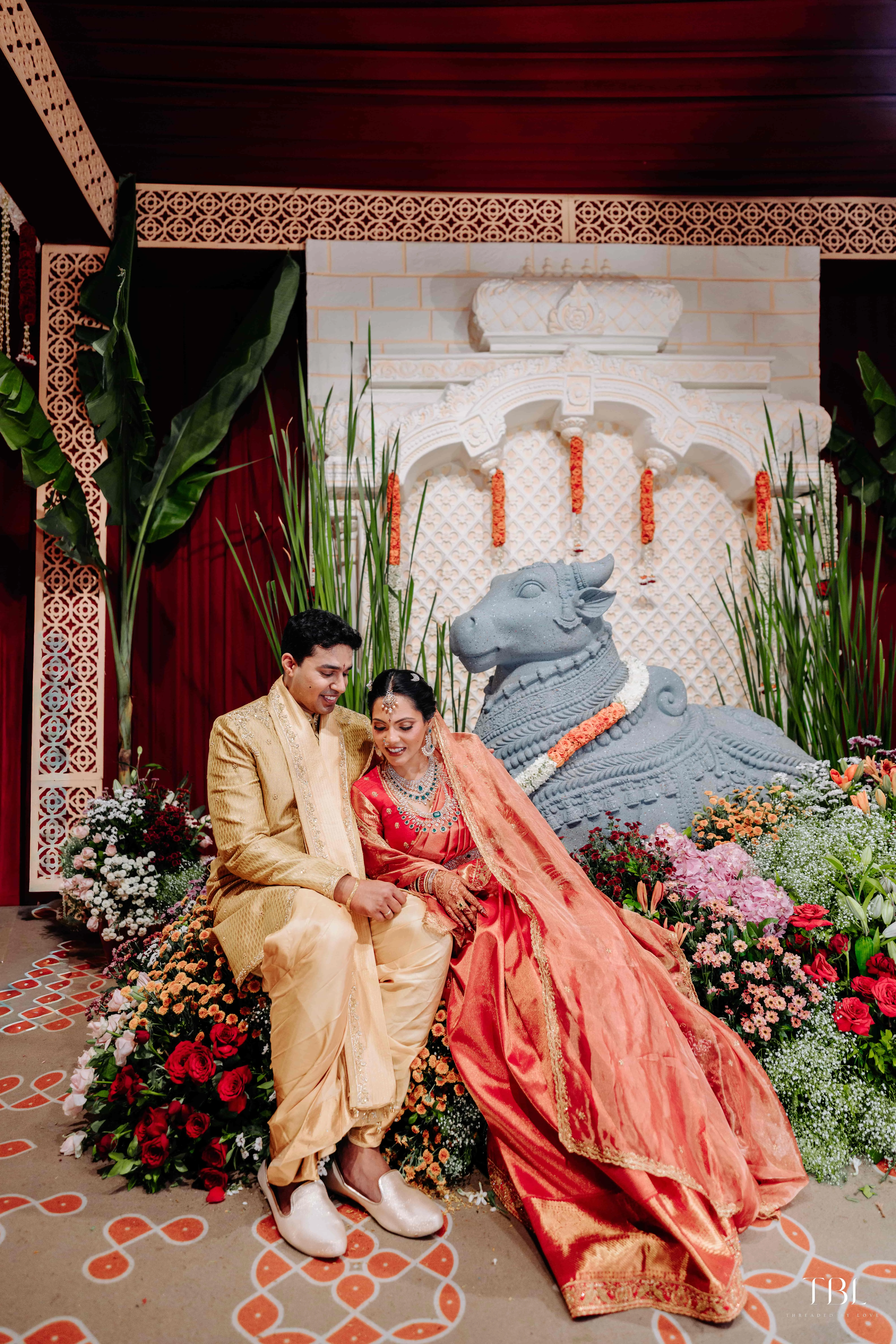 Temple-theme wedding decor at the beach during the celebration night