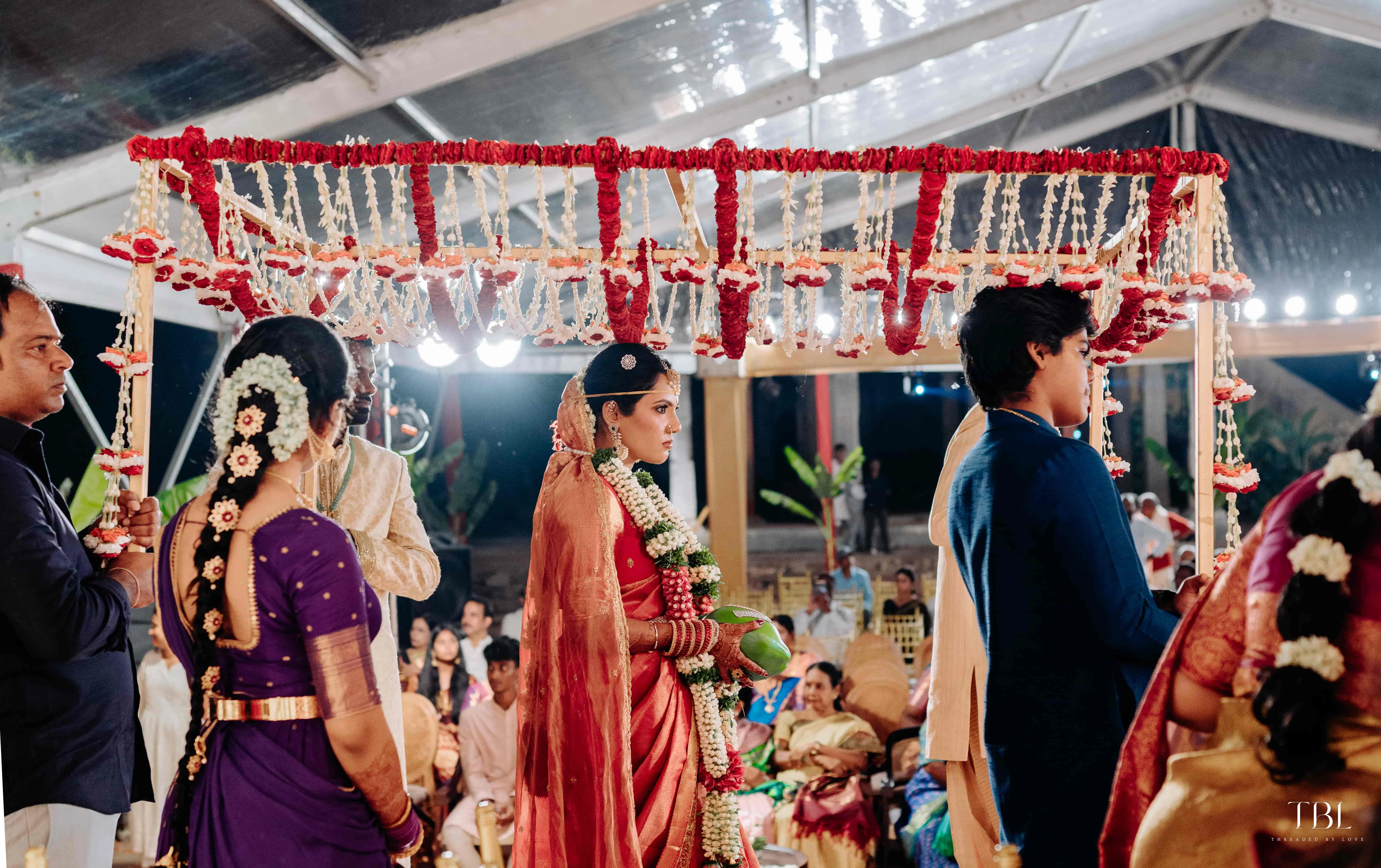 Anusha and Satya sharing an emotional, warm first hug portrait immediately following their marriage ceremony